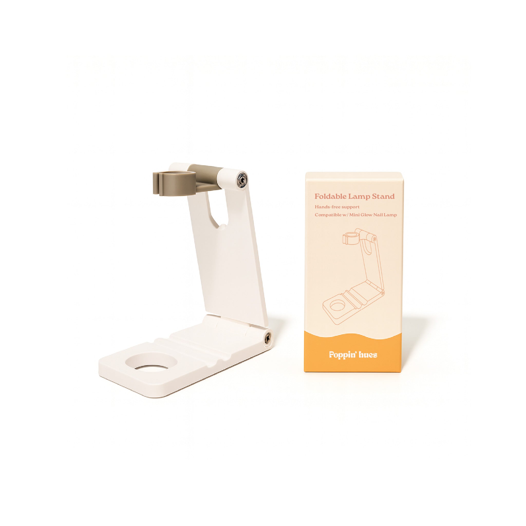 White foldable nail lamp stand displayed on a white background alongside its product box.
